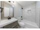Modern bathroom features marbled tile, brushed black fixtures, and a tub-shower combination at 141 Nathan Rd, Atlanta, GA 30331