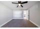 Neutral bedroom with carpet, closet and access to a modern kitchen at 141 Nathan Rd, Atlanta, GA 30331