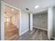 Hallway leading into a room featuring vinyl plank flooring and neutral walls at 141 Nathan Rd, Atlanta, GA 30331