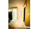 Hallway with tan paint, tile floor, and white trim at 3793 Mays Sw Ct, Atlanta, GA 30331
