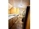 Efficient kitchen features sleek countertops, stainless steel appliances, and ample storage space at 3793 Mays Sw Ct, Atlanta, GA 30331