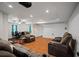 Finished basement with theater seating and movie screen at 385 Guildhall Grv, Johns Creek, GA 30022