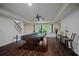 Finished basement with a pool table and access to the outdoor space at 385 Guildhall Grv, Johns Creek, GA 30022