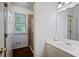 Clean bathroom with shower and functional vanity at 385 Guildhall Grv, Johns Creek, GA 30022