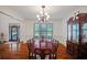 Elegant dining room with hardwood floors and beautiful furnishings at 385 Guildhall Grv, Johns Creek, GA 30022