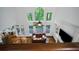 Open floor plan living room with hardwood floors, a high ceiling, and large windows at 385 Guildhall Grv, Johns Creek, GA 30022