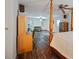 Open bedroom with views of living area and backyard, plus an ensuite bathroom at 385 Guildhall Grv, Johns Creek, GA 30022