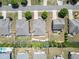 Aerial view featuring uniform roofs, landscaped yards and stone walkways in a peaceful residential area at 813 Cotton Creek Dr, Canton, GA 30115