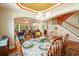 Elegant dining room with a chandelier and seating for six, perfect for Gathering gatherings at 813 Cotton Creek Dr, Canton, GA 30115