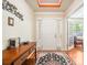 Bright foyer with hardwood floors, a console table, and decorative accents at 813 Cotton Creek Dr, Canton, GA 30115