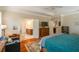 Bright main bedroom featuring hardwood floors, neutral walls, and easy access to the main bathroom at 813 Cotton Creek Dr, Canton, GA 30115