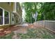 Large backyard, patio and home exterior at 9050 Brockham Way, Alpharetta, GA 30022