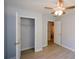 Bedroom features a ceiling fan, closet and bathroom access at 9050 Brockham Way, Alpharetta, GA 30022