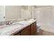 Bathroom with a dual sink vanity and tub shower at 5712 Grande River Rd, Atlanta, GA 30349
