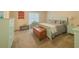 Cozy bedroom featuring blue furniture and carpeted floors at 710 Bentgrass Ct, Dacula, GA 30019