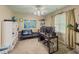 Functional bedroom featuring a desk, shelves, and a window for a productive work space at 710 Bentgrass Ct, Dacula, GA 30019