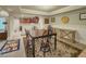 Finished basement dining area featuring table with seating and view of kitchenette at 710 Bentgrass Ct, Dacula, GA 30019