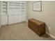 Bright living room with built-in shelving and cabinetry at 710 Bentgrass Ct, Dacula, GA 30019
