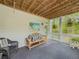 Inviting covered patio with comfortable seating at 710 Bentgrass Ct, Dacula, GA 30019