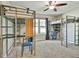 Bedroom with carpeting, a ceiling fan, two sets of bunk beds and two small desks at 108 Shawville Ln, Peachtree City, GA 30269