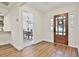 Entryway with hardwood floors and a view into the dining room at 108 Shawville Ln, Peachtree City, GA 30269