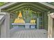 Unique indoor playhouse with bench, storage, and whimsical decorations at 108 Shawville Ln, Peachtree City, GA 30269