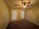 Bedroom with neutral walls, carpet, two windows that let in natural light, and ceiling fan at 124 Sparkling Spring Trl, Mcdonough, GA 30252