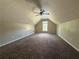 Bonus room featuring carpet, fan, window, and neutral walls at 124 Sparkling Spring Trl, Mcdonough, GA 30252