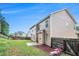 View of the home's rear exterior, showcasing the siding and backyard at 2717 High Creek Run, Dacula, GA 30019
