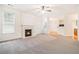 Bright living room with fireplace and lots of natural light at 2717 High Creek Run, Dacula, GA 30019