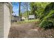 View of the backyard with a shed and fence separating the property at 3294 Renault Se Rd, Atlanta, GA 30354