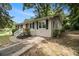 Well-maintained home featuring manicured landscaping and a concrete driveway at 3294 Renault Se Rd, Atlanta, GA 30354