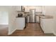 Modern kitchen with stainless steel appliances, granite countertops, and white cabinetry at 3294 Renault Se Rd, Atlanta, GA 30354