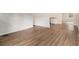 Open-concept layout showcases seamless flow with hardwood floors and inviting ambiance at 3294 Renault Se Rd, Atlanta, GA 30354