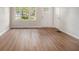Bright and airy living room featuring beautiful hardwood floors and ample natural light at 3294 Renault Se Rd, Atlanta, GA 30354