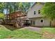 Backyard view featuring a covered patio, yard, and the back of the house at 3665 Pine St, Atlanta, GA 30340
