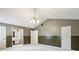 Bedroom with large closet doors and adjoining bathroom at 3665 Pine St, Atlanta, GA 30340