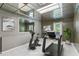 Home gym featuring mirrored walls and modern equipment at 3665 Pine St, Atlanta, GA 30340