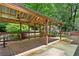This backyard patio features a covered pergola, perfect for outdoor living and entertaining at 3665 Pine St, Atlanta, GA 30340