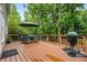 Back deck area with a grill and outdoor seating at 3944 Blustery Ne Way, Marietta, GA 30066