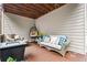 Cozy covered back deck with outdoor seating and decor at 3944 Blustery Ne Way, Marietta, GA 30066