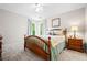 Cozy bedroom with carpet, wooden furniture, and two windows offering ample natural light at 3944 Blustery Ne Way, Marietta, GA 30066