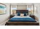 Bedroom with a large bed, two matching nightstands, and recessed lighting at 379 Morgan Rd, Carrollton, GA 30116