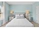 Charming bedroom featuring neutral walls, stylish furniture, and lots of natural light at 379 Morgan Rd, Carrollton, GA 30116