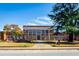 Exterior shot of a red brick community center with landscaped grounds, offering a welcoming presence at 379 Morgan Rd, Carrollton, GA 30116