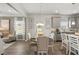 Bright dining area with stylish decor, a round table, and natural light streaming through the windows at 379 Morgan Rd, Carrollton, GA 30116