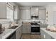 Functional kitchen featuring stainless appliances, granite counters, and ample storage at 379 Morgan Rd, Carrollton, GA 30116