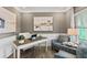 Cozy home office features a stylish desk, comfortable seating, and soothing decor at 379 Morgan Rd, Carrollton, GA 30116