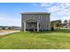 Beautiful two-story home features a covered patio and large backyard, perfect for outdoor gatherings at 379 Morgan Rd, Carrollton, GA 30116