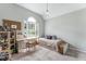 Neutral bedroom with a study area and ample natural light perfect for learning and play at 4045 Bridle Ridge Dr, Suwanee, GA 30024